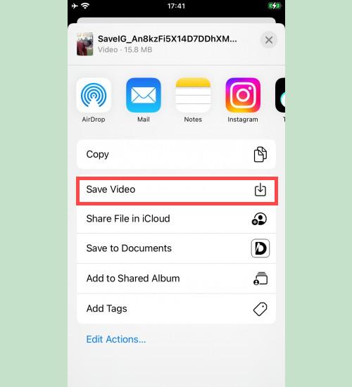 Saving Video from SaveIG to Photos: iPhone screen displaying the option to 